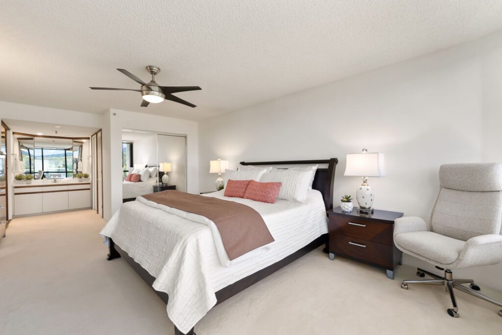 Primary suite with ensuite bath, generous layout, and natural light.