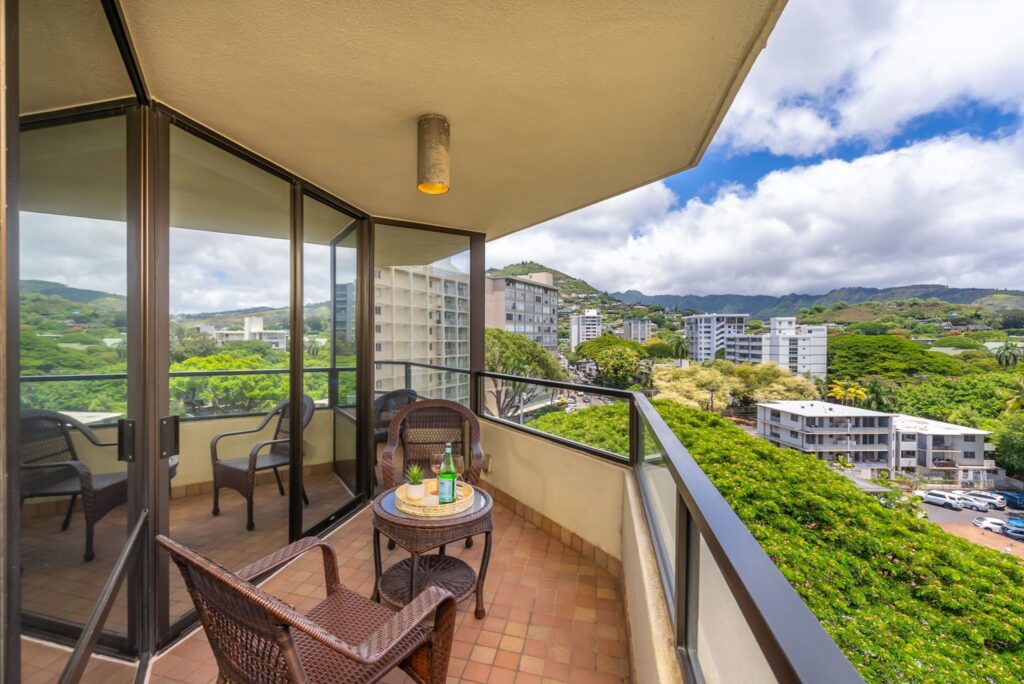 Private lanai with sweeping mountain and neighborhood vistas at Punahou Cliffs #905