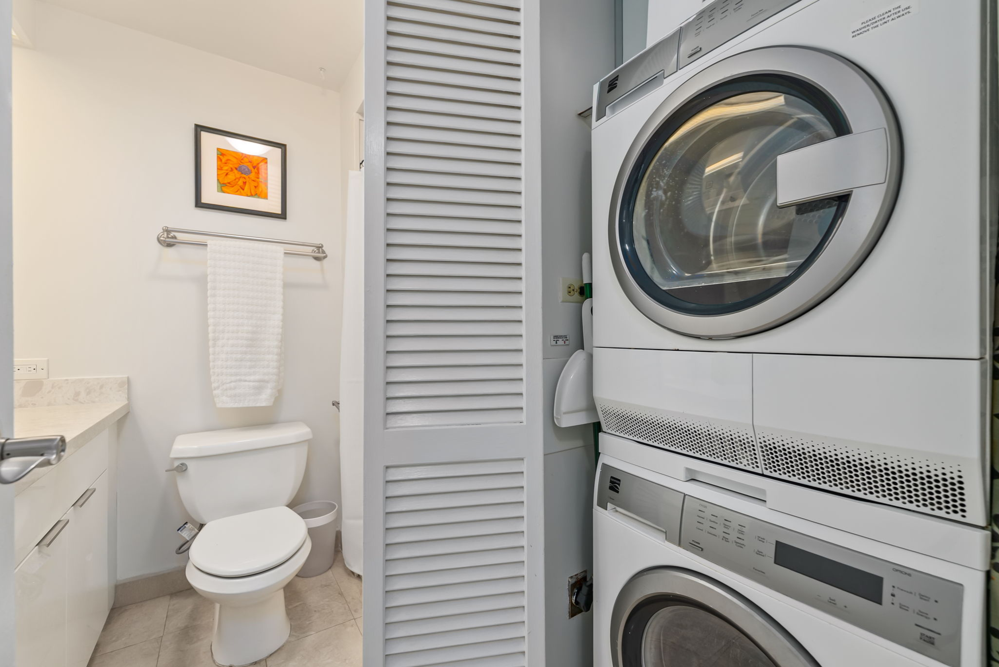 bathroom and washing machine and dryer