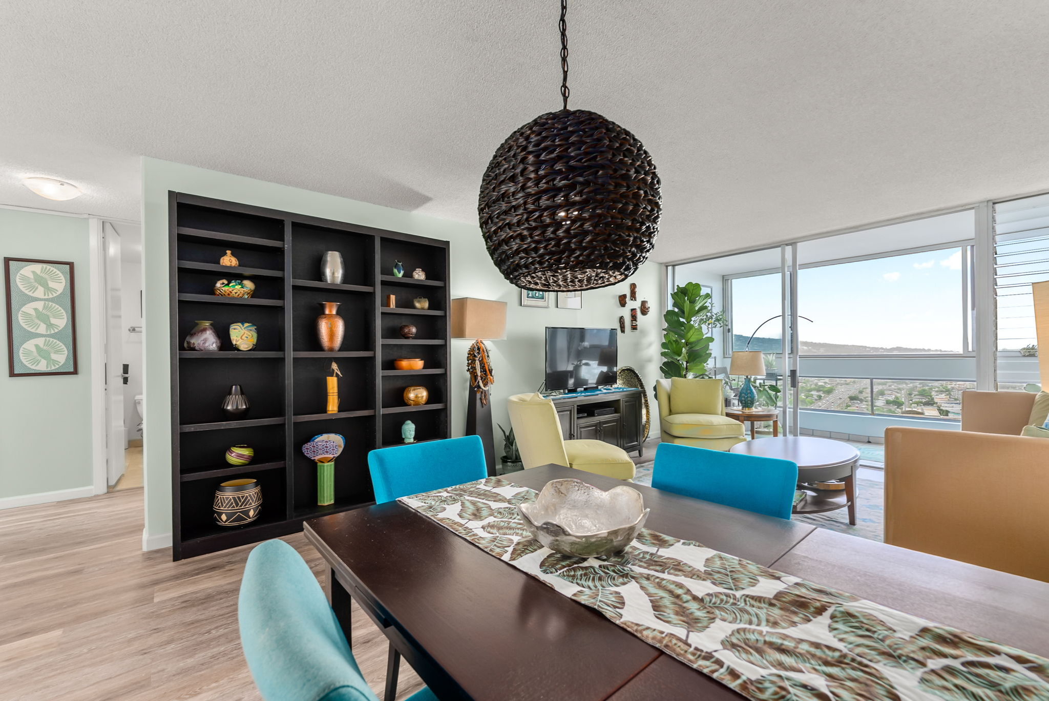 Dining area and partial living area at a condo in Honolulu
