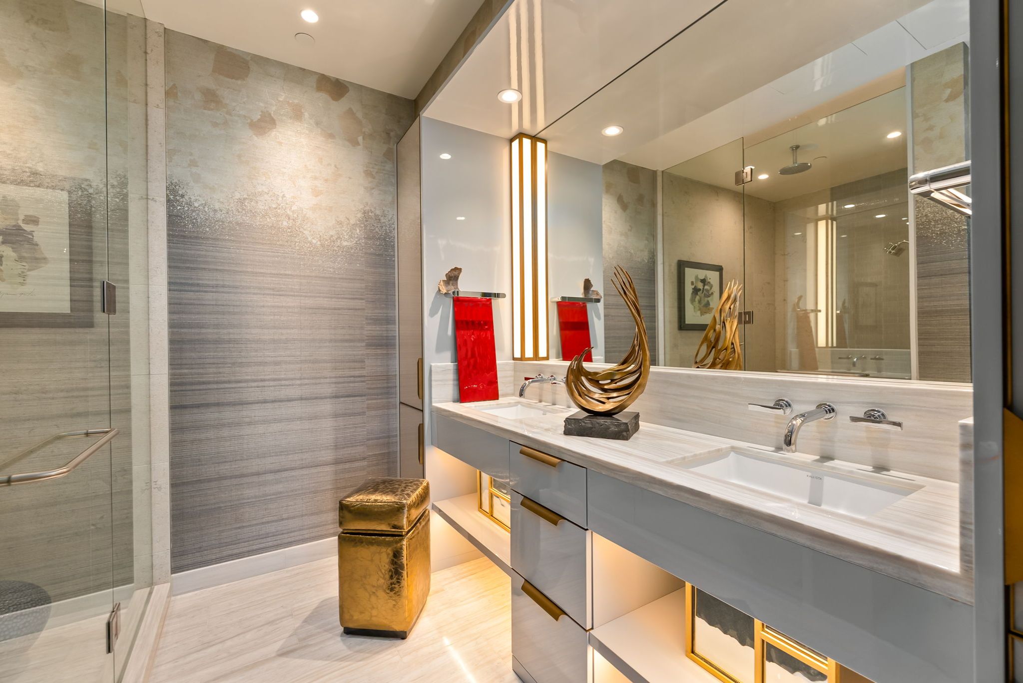 Luxury bathroom at Victoria Place Grand Penthouse 4003 with custom vanity, glass shower and refined finishes