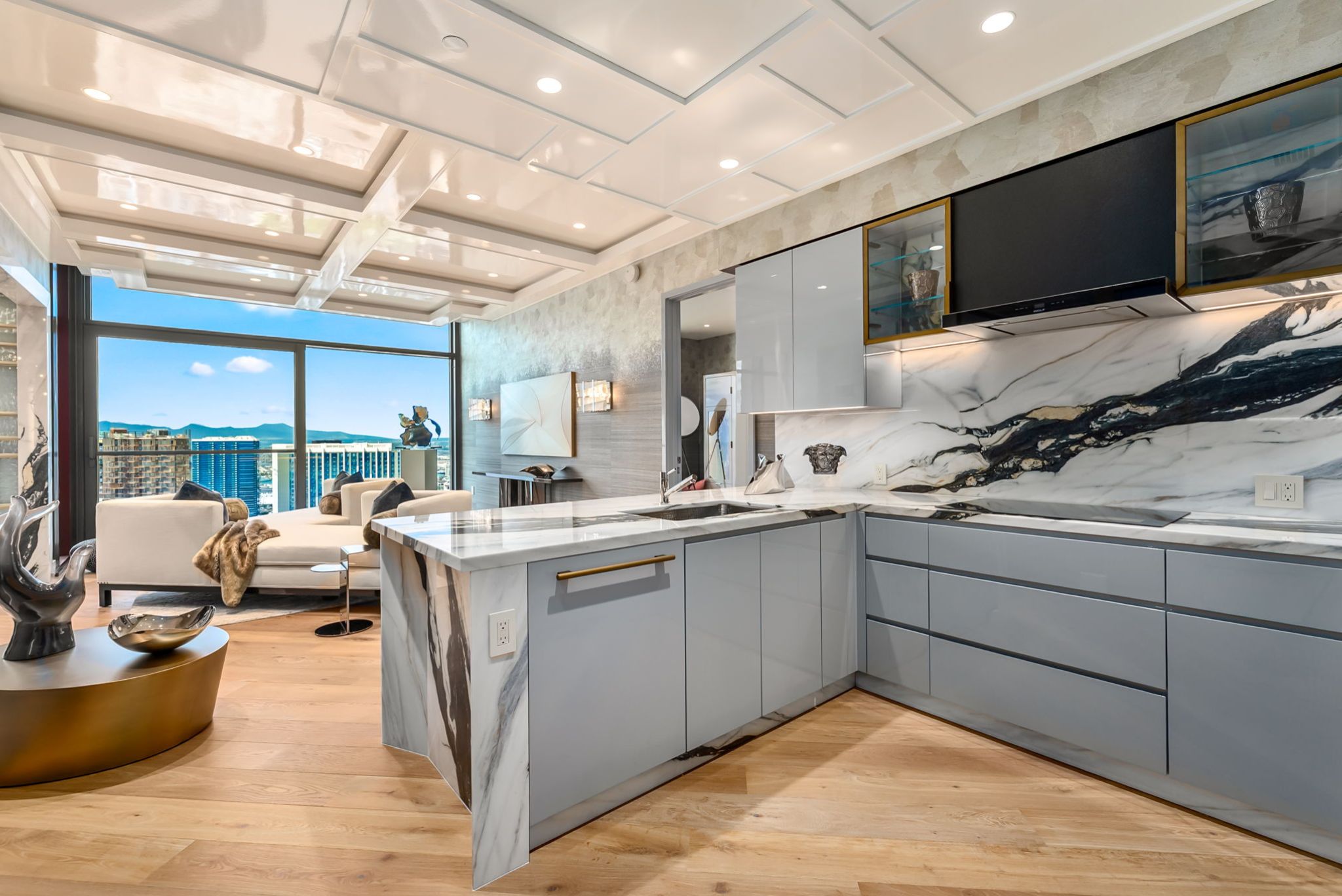 Luxury kitchen with Covelano marble and open-concept living area