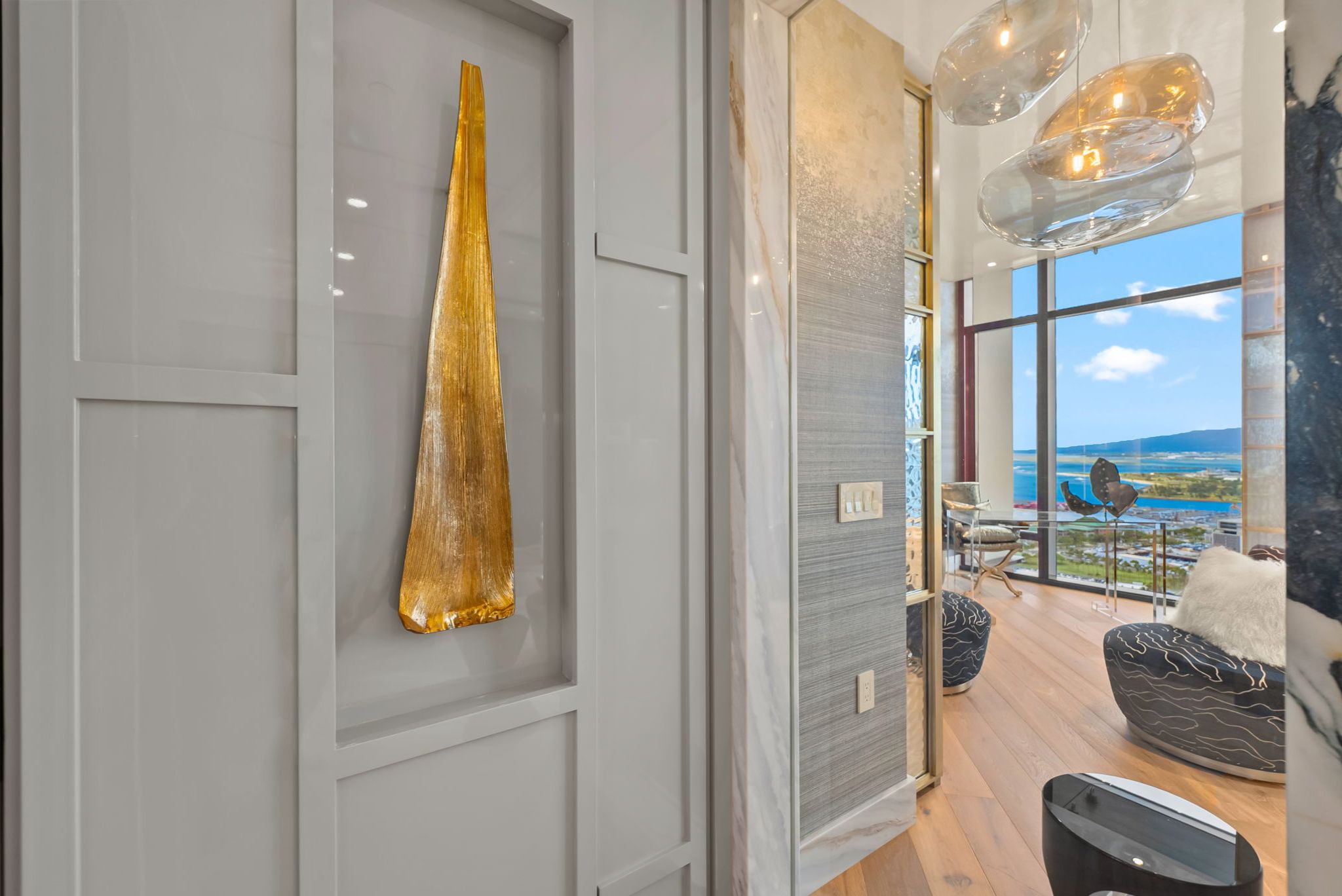 Custom architectural details and ocean views inside Grand Penthouse 4003 in Honolulu