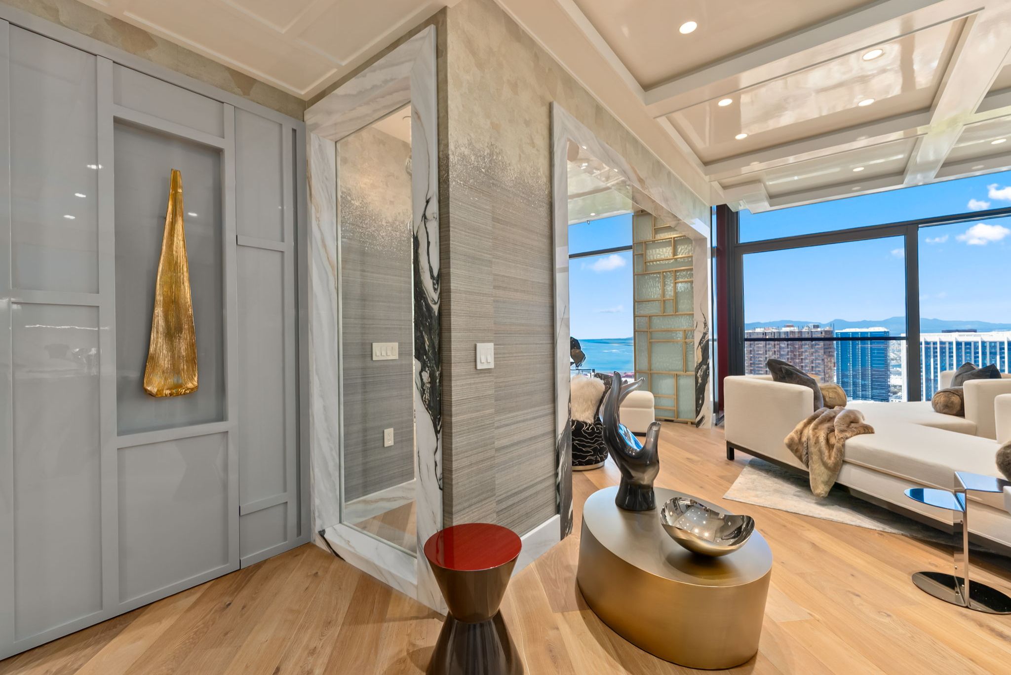 Bespoke interior of Grand Penthouse 4003 with marble architectural details and floor-to-ceiling ocean views